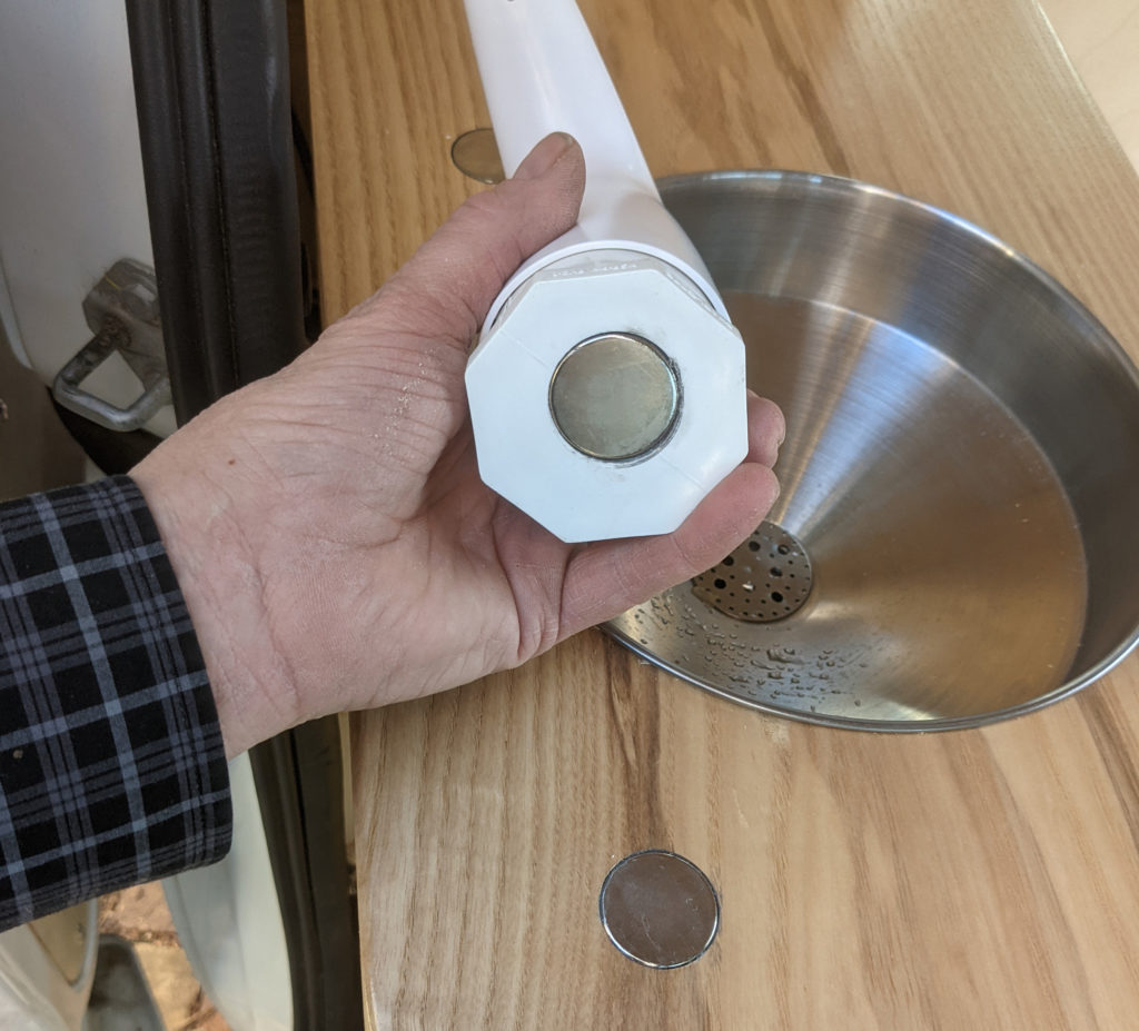 Magnet glued into PVC plug
